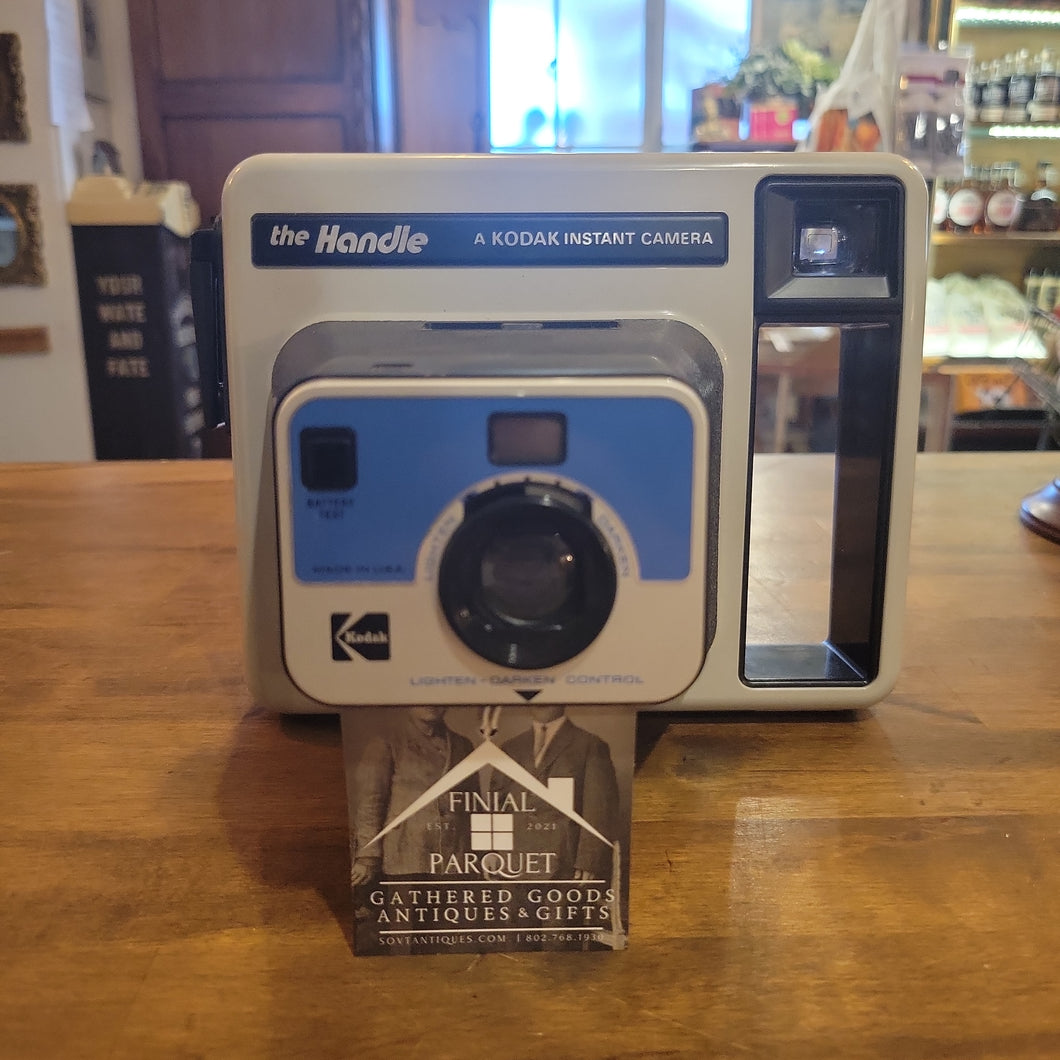 The Handle Kodak Instant Camera